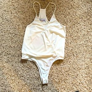 Kittenish bodysuit. New with tags!